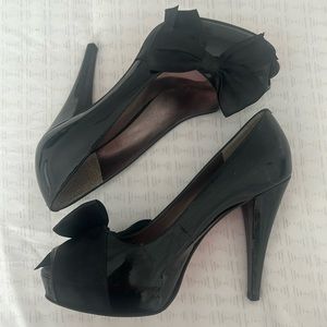 Paris Hilton heels with bow accent